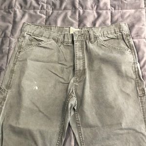 Schmidt workwear, 36x30, green, two spots of white paint